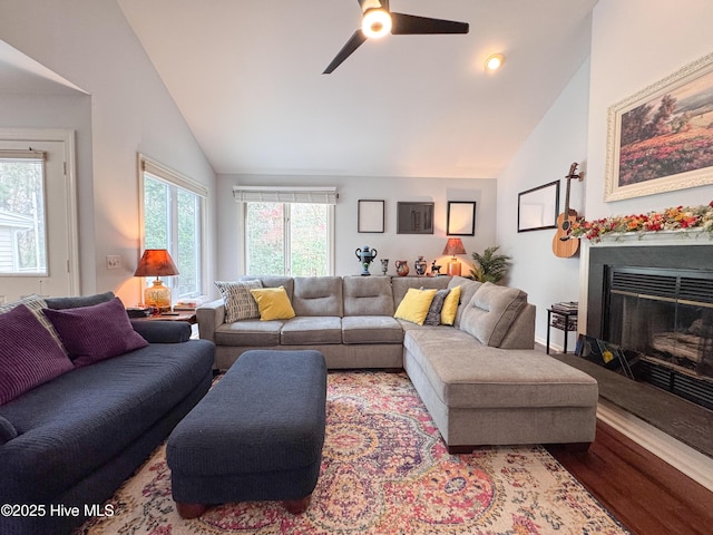 310 Wimbledon Ct, Wilmington, NC 28412 - living area featuring vaulted ceiling, wood finished floors, ceiling fan, and a glass covered fireplace