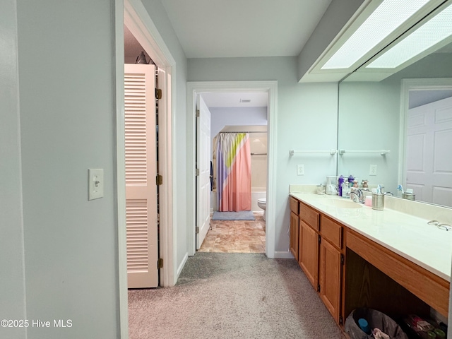 310 Wimbledon Ct, Wilmington, NC 28412 - bathroom with toilet, vanity, baseboards, carpet, and a shower with shower curtain