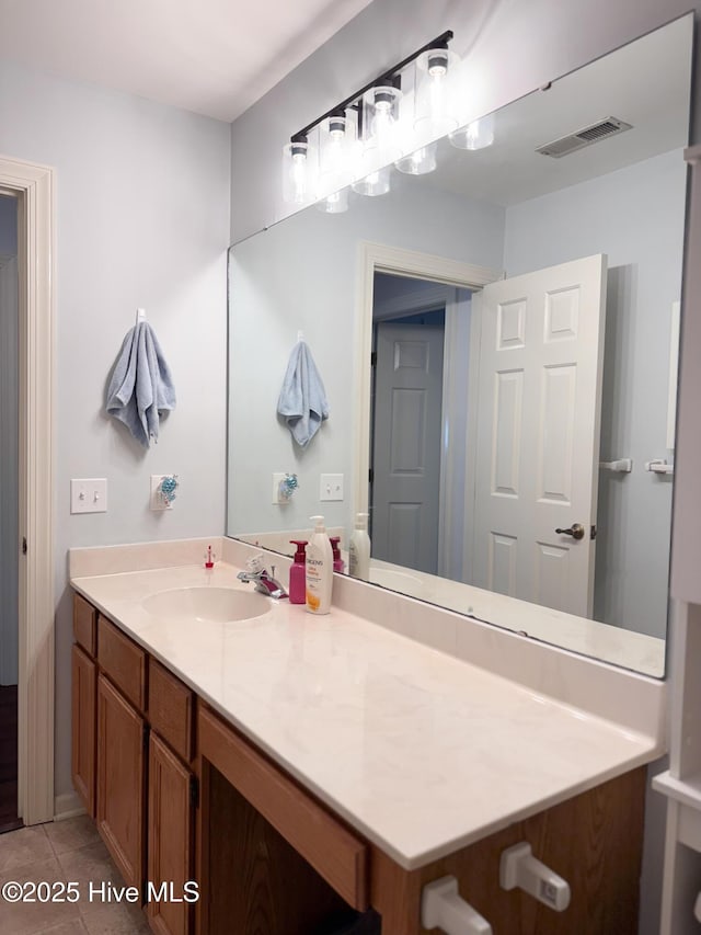 310 Wimbledon Ct, Wilmington, NC 28412 - bathroom featuring vanity and tile patterned flooring
