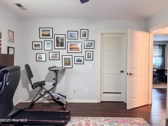 310 Wimbledon Ct, Wilmington, NC 28412 - exercise area featuring dark wood-style floors and baseboards