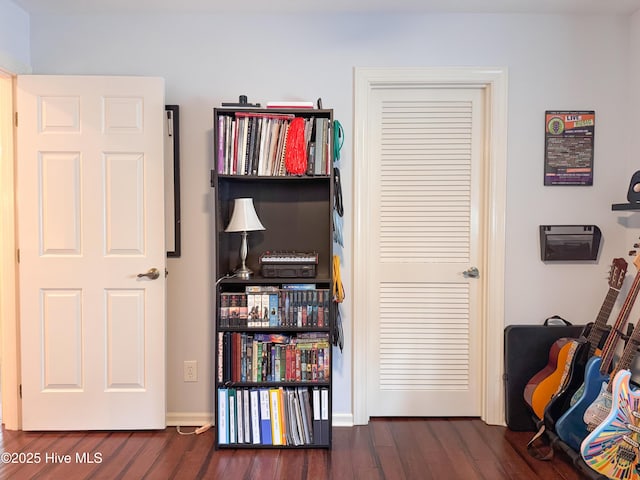 310 Wimbledon Ct, Wilmington, NC 28412 - sitting room with dark wood-style flooring and baseboards