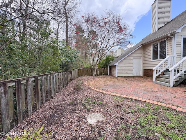 310 Wimbledon Ct, Wilmington, NC 28412 - fenced backyard featuring a patio