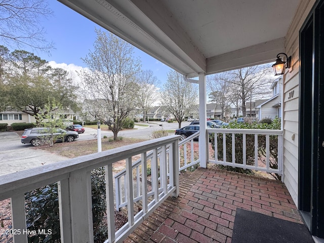 310 Wimbledon Ct, Wilmington, NC 28412 - porch featuring a residential view
