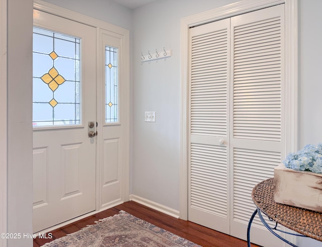 310 Wimbledon Ct, Wilmington, NC 28412 - entryway with dark wood-style flooring and baseboards