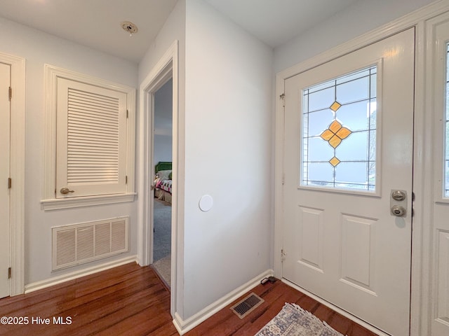 310 Wimbledon Ct, Wilmington, NC 28412 - foyer entrance featuring dark wood-style flooring and baseboards