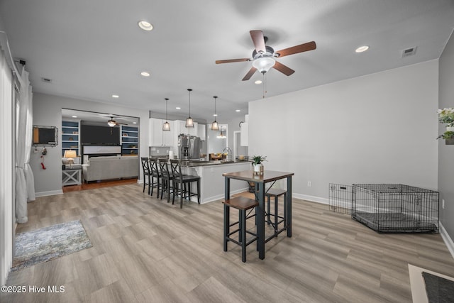 115 Marie Ct, Havelock, NC 28532 - dining area with a ceiling fan, visible vents, recessed lighting, light wood finished floors, and baseboards
