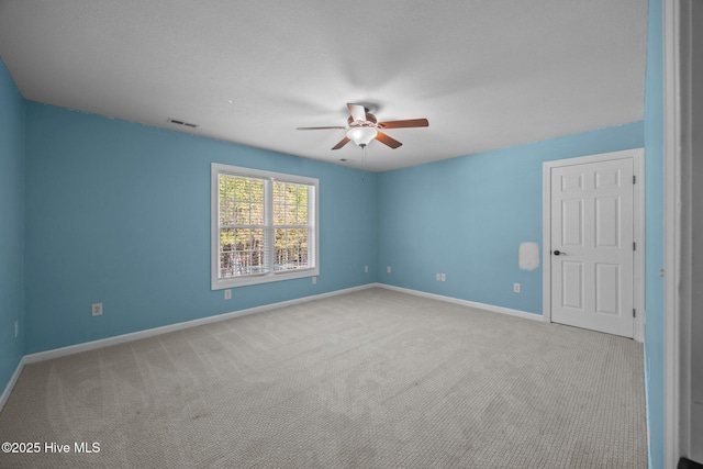 115 Marie Ct, Havelock, NC 28532 - carpeted empty room with baseboards, a ceiling fan, and visible vents