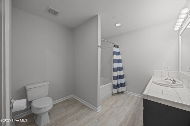 115 Marie Ct, Havelock, NC 28532 - full bathroom with shower / tub combo, vanity, baseboards, toilet, and visible vents