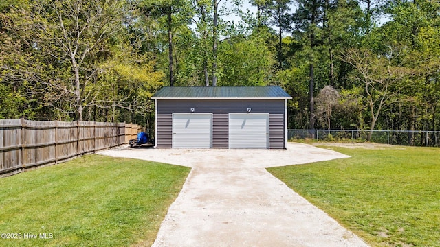 115 Marie Ct, Havelock, NC 28532 - detached garage featuring fence