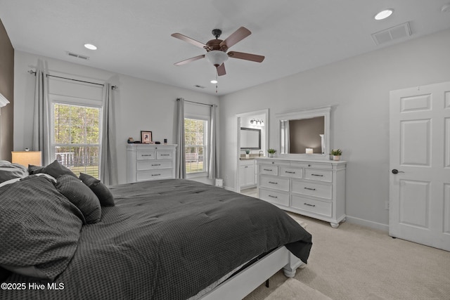 115 Marie Ct, Havelock, NC 28532 - bedroom with visible vents, multiple windows, and light colored carpet