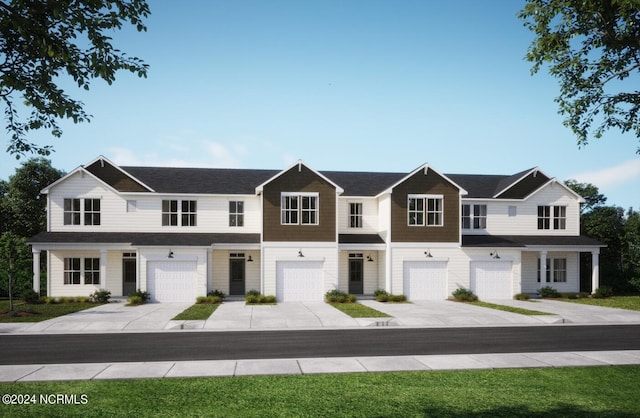 5134 Northstar Dr Unit 28, Leland, NC 28451 - townhome / multi-family property featuring an attached garage and driveway