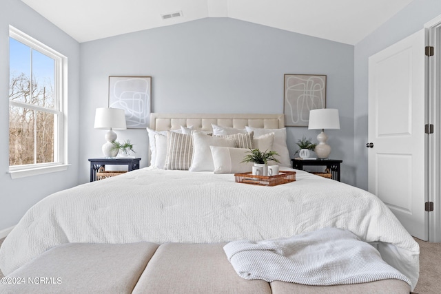 5134 Northstar Dr Unit 28, Leland, NC 28451 - carpeted bedroom featuring lofted ceiling and visible vents