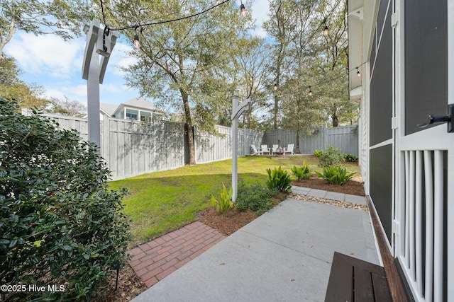 view of yard featuring a fenced backyard and a patio area