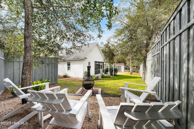 view of yard with fence