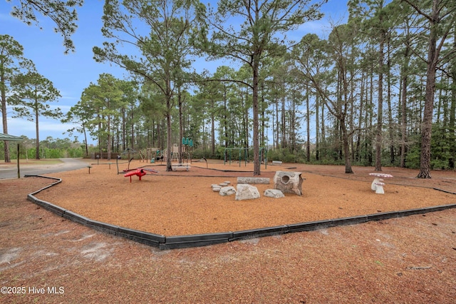 view of property's community featuring playground community