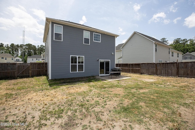 rear view of property with a patio