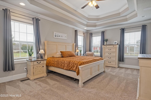 bedroom featuring baseboards, light colored carpet, and ornamental molding