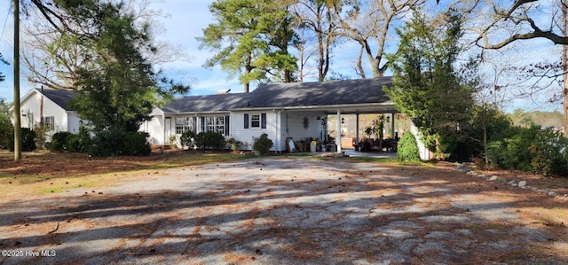 6693 NC-92, Bath, NC 27808 - view of front of home featuring aphalt driveway and an attached carport