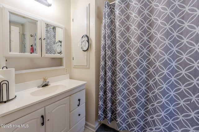 full bathroom featuring curtained shower, elevator, and vanity