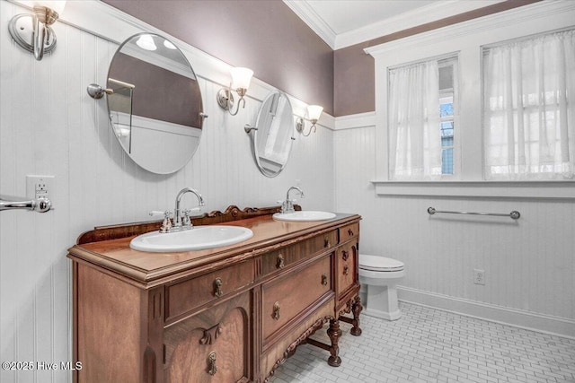 705 Park Ave, Goldsboro, NC 27530 - bathroom with a sink, toilet, double vanity, and crown molding
