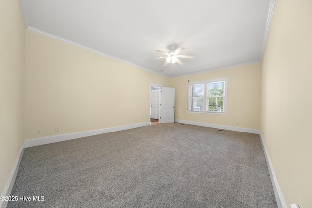 604 Fourth St S, Carolina Beach, NC 28428 - carpeted spare room featuring a ceiling fan and ornamental molding