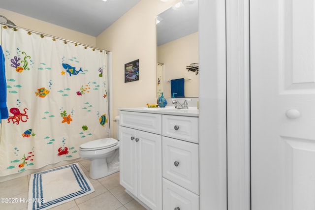 604 Fourth St S, Carolina Beach, NC 28428 - bathroom with tile patterned floors, vanity, and a shower with shower curtain