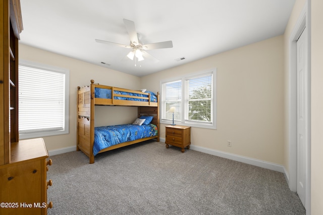604 Fourth St S, Carolina Beach, NC 28428 - carpeted bedroom featuring a closet and ceiling fan