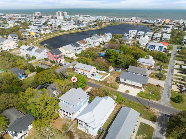604 Fourth St S, Carolina Beach, NC 28428 - aerial perspective of suburban area featuring a large body of water