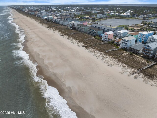 604 Fourth St S, Carolina Beach, NC 28428 - bird's eye view of waterfront with a beach