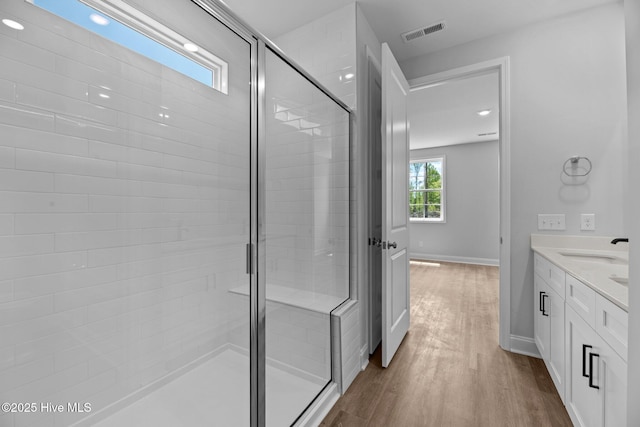 1007 Tawney Trce, New Bern, NC 28562 - full bathroom featuring a shower stall, wood finished floors, baseboards, and vanity