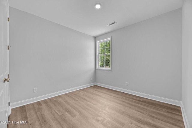 1007 Tawney Trce, New Bern, NC 28562 - spare room featuring baseboards and wood finished floors