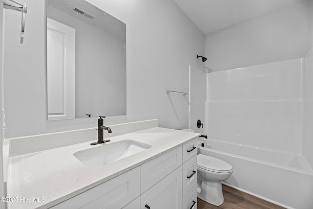 1007 Tawney Trce, New Bern, NC 28562 - full bathroom with wood finished floors, toilet, vanity, and shower / tub combination