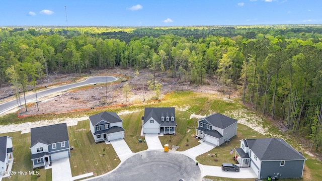 1007 Tawney Trce, New Bern, NC 28562 - aerial perspective of suburban area featuring a forest