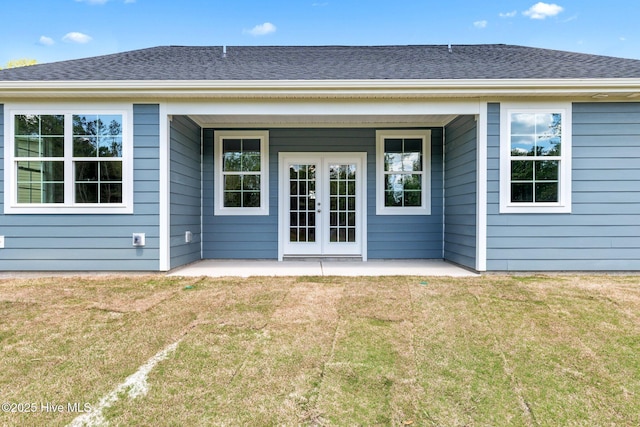 1007 Tawney Trce, New Bern, NC 28562 - back of house with a patio area, a lawn, french doors, and a shingled roof