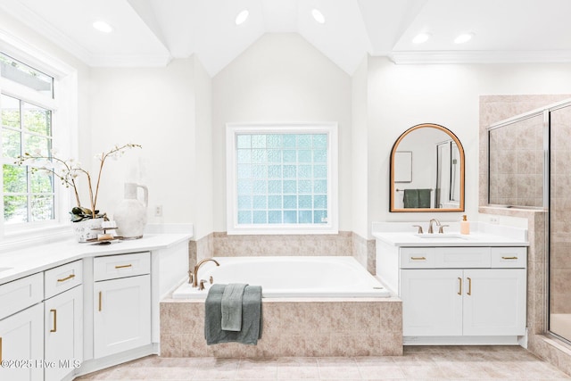 6932 Runningbrook Ter, Wilmington, NC 28411 - bathroom with vanity, a garden tub, a stall shower, ornamental molding, and recessed lighting