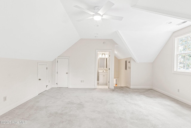 6932 Runningbrook Ter, Wilmington, NC 28411 - bonus room featuring a ceiling fan, light carpet, and vaulted ceiling