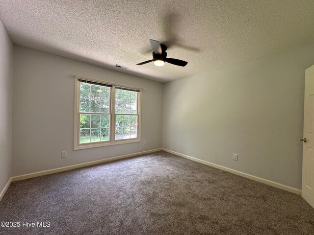 146 Olde Point Rd, Hampstead, NC 28443 - empty room featuring ceiling fan, carpet, and a textured ceiling