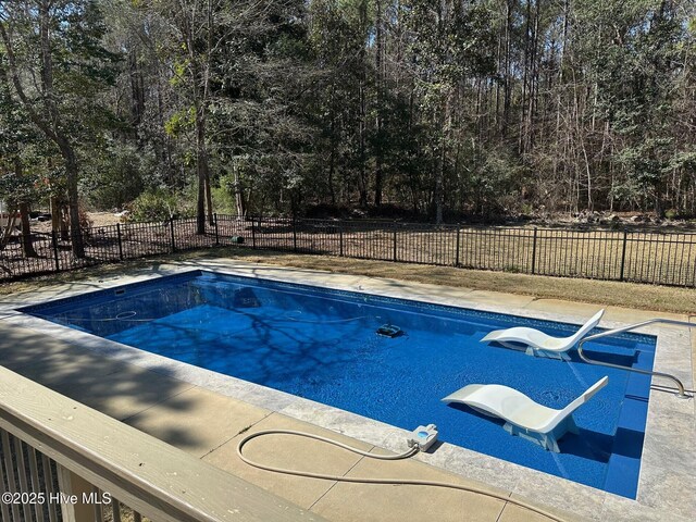 146 Olde Point Rd, Hampstead, NC 28443 - view of swimming pool with view of scattered trees