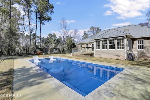 146 Olde Point Rd, Hampstead, NC 28443 - swimming pool with a wooden deck and a patio area