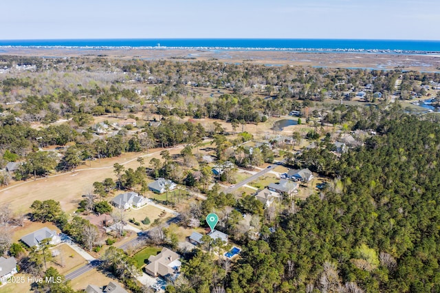 146 Olde Point Rd, Hampstead, NC 28443 - aerial view of property and surrounding area featuring a large body of water and nearby suburban area