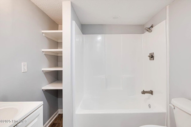 304 N Saratoga St, Stantonsburg, NC 27883 - bathroom featuring toilet, wood finished floors, shower / bathtub combination, vanity, and baseboards