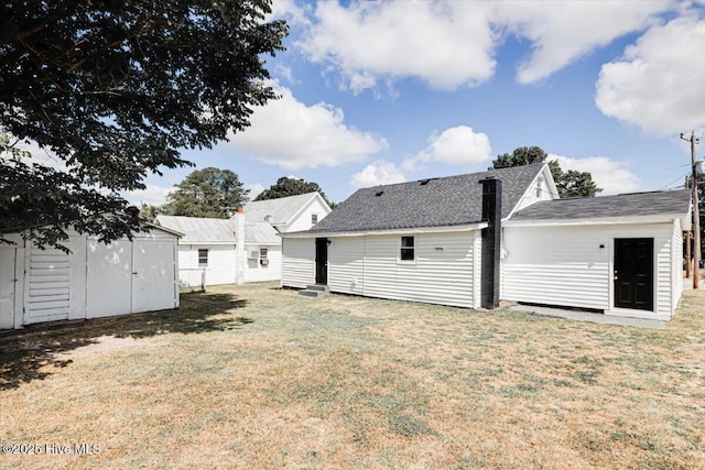 304 N Saratoga St, Stantonsburg, NC 27883 - rear view of house with a yard and a shingled roof