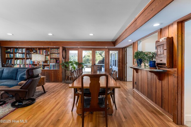 dining area with recessed lighting, light wood-style floors, and french doors