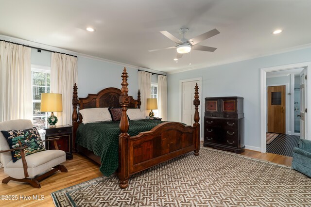 bedroom featuring a ceiling fan, wood finished floors, recessed lighting, and ornamental molding