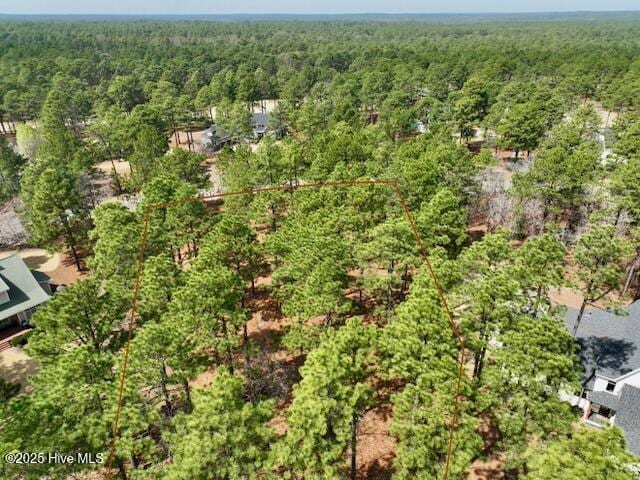 103 Chesterfield Dr, Pinehurst, NC 28374 - aerial overview of property's location featuring a forest and property parcel outlined