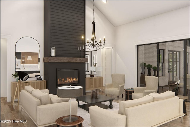 103 Chesterfield Dr, Pinehurst, NC 28374 - living room with high vaulted ceiling, wood finished floors, a chandelier, and a glass covered fireplace