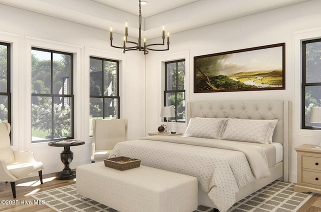 103 Chesterfield Dr, Pinehurst, NC 28374 - bedroom with wood finished floors, a chandelier, and multiple windows