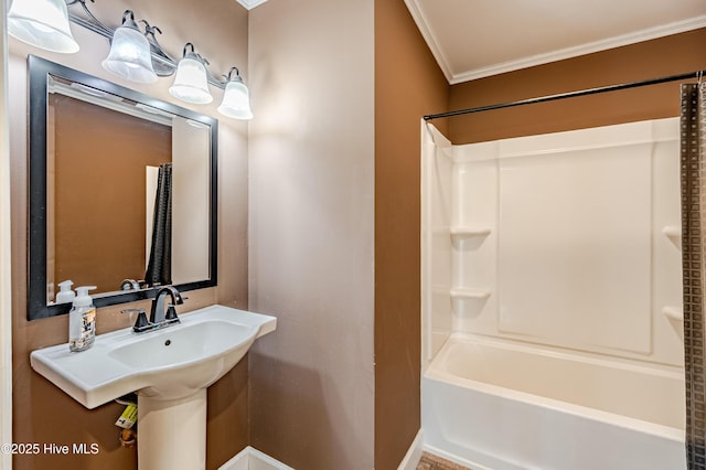 full bath with tub / shower combination and crown molding