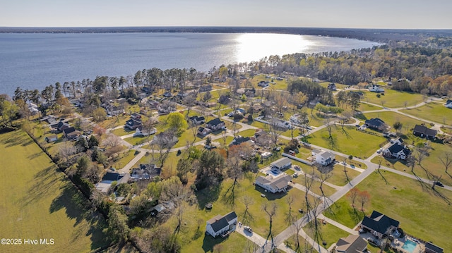 bird's eye view featuring a residential view and a water view