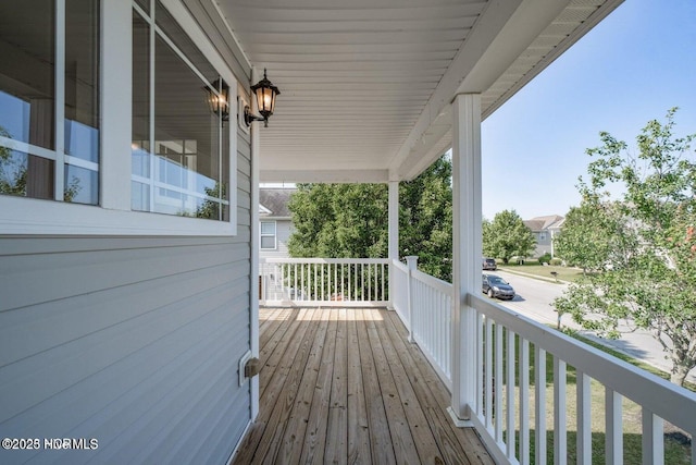 wooden terrace with covered porch